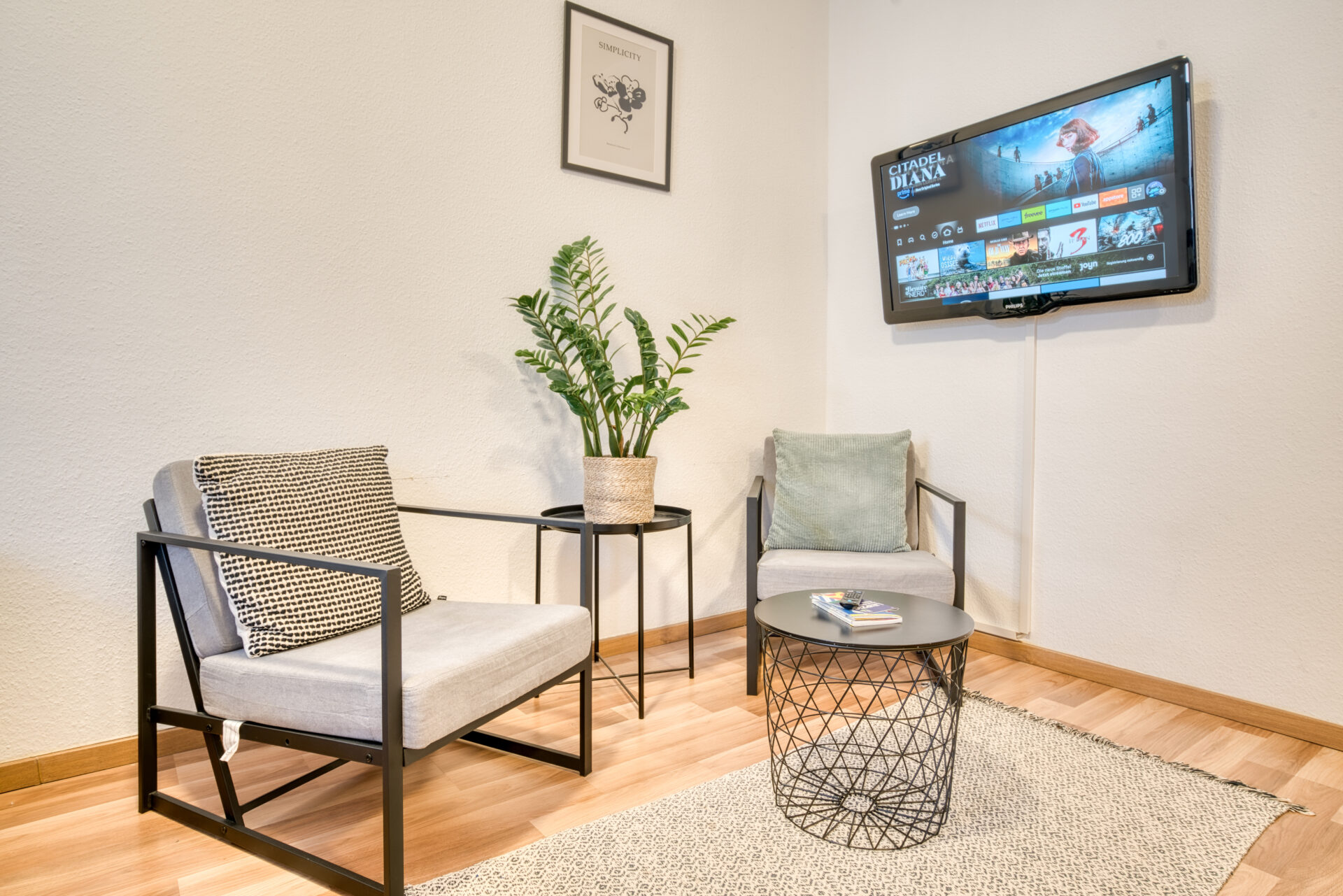Sitzecke und TV-Bereich eines Hotels in Leipzig. Fotograf für Hotel.