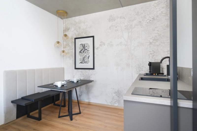 Ferienwohnung Airbnb Leipzig Zentrum Bayerischer Bahnhof - Maison and Mood7 Essbereich mit Sitzecke und Küchenzeile einer Ferienwohnung in Leipzig